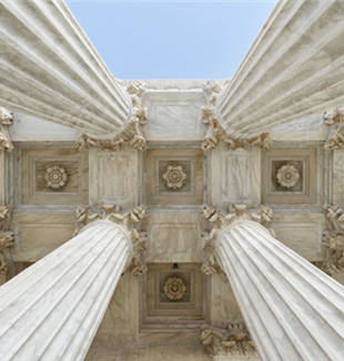 Pillars of the Supreme Court of the United States (Photo Credit: Jesse Collins // Unsplash)